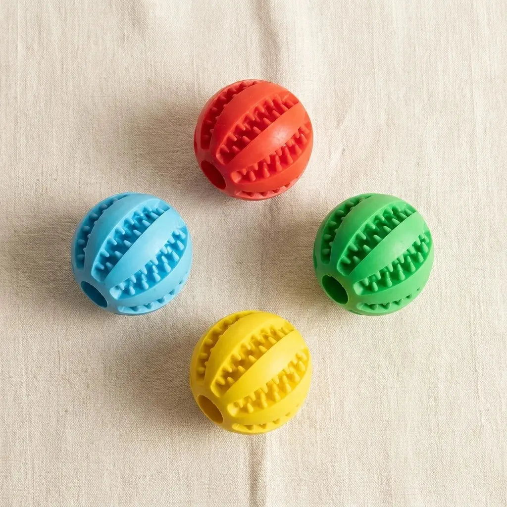 ChewMelo™ dog chew toy available in red, sky blue, green and yellow
