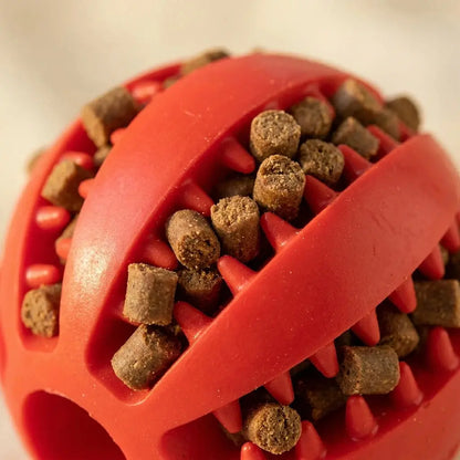 ChewMelo™ red dog chew toy treats pressed into grooves