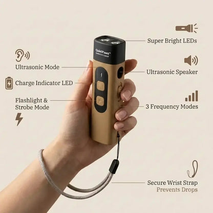QuietPaws™ Gentle Bark Control ultrasonic pest control device held in a hand with features.