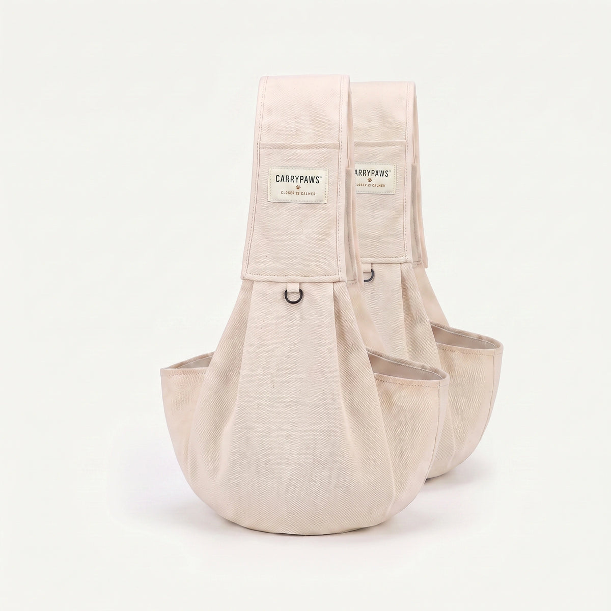 Beige CarryPaws dog sling carrier, two pack