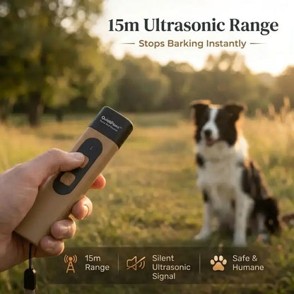 Hand holding a brown QuietPaws™ bark control device with a Border Collie sitting calmly in a field, showing the 15m ultrasonic range